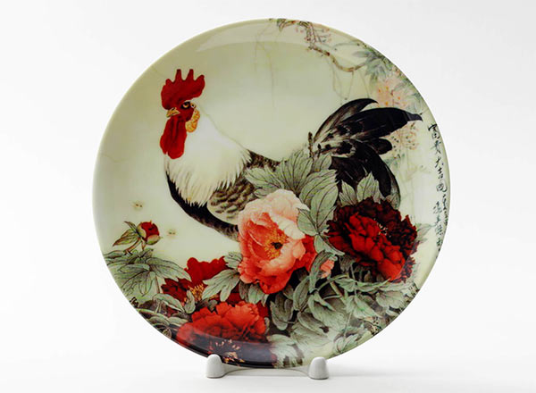 Decorative plate Unknown artist Rooster in the garden