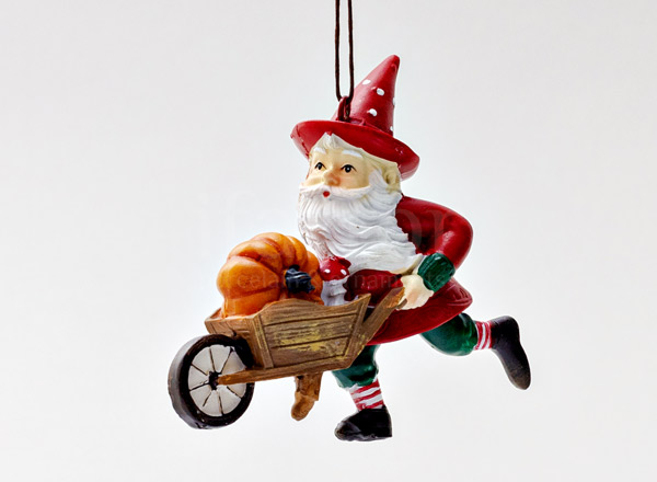 Christmas tree toy Gnome with a wheelbarrow
