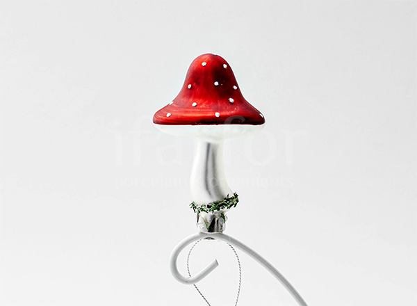 Christmas tree toy Mushrooms. Fly agaric on a clothespin