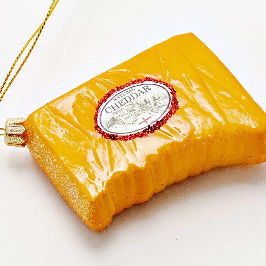 Елочная игрушка «Сыр Cheddar» Стекло. 65 x 85 мм.