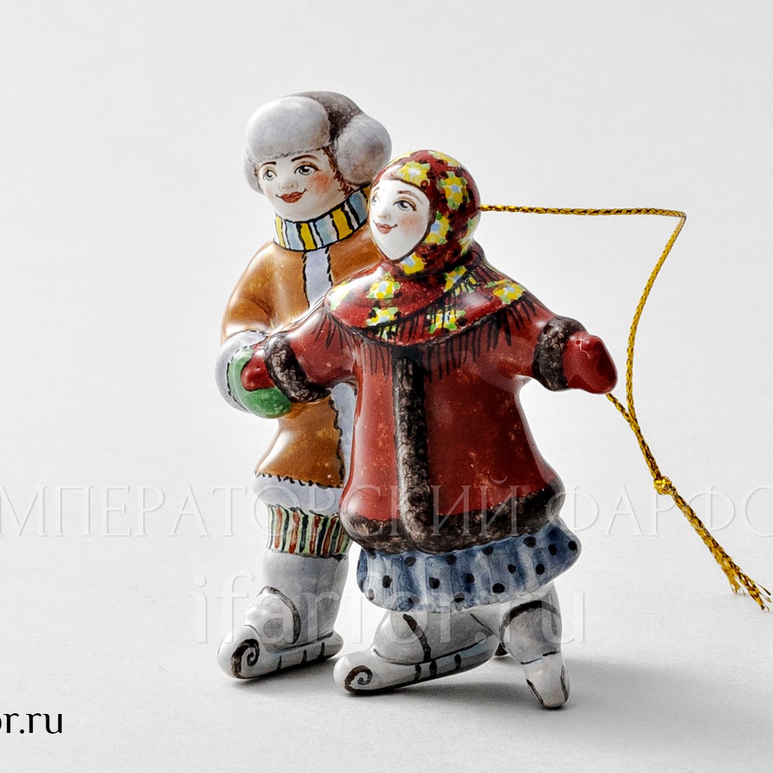 Елочная игрушка «Дети на коньках» Форма: Дети на коньках. Майолика. 75 x 85 мм.