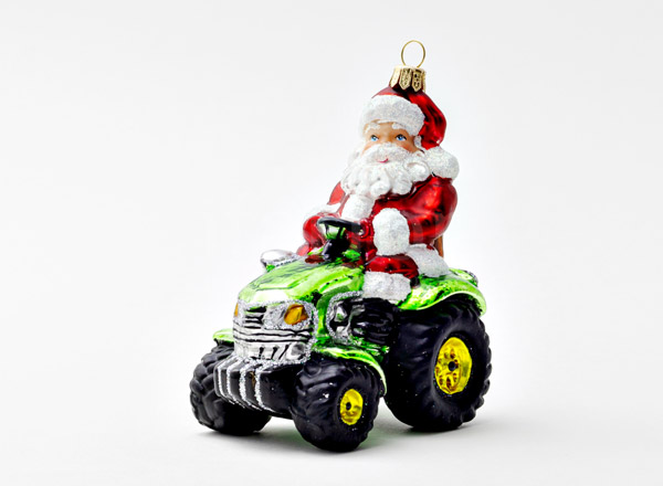 Christmas tree toy Santa Claus on a tractor