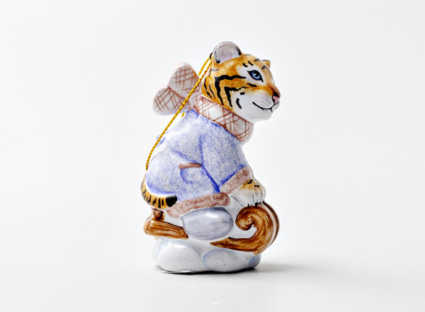 Christmas tree toy Tiger cub on a sled