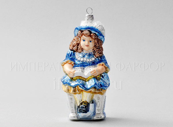 Christmas tree toy Alice with a book