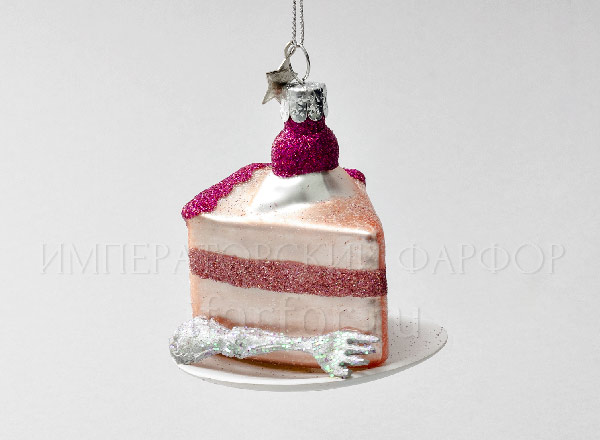 Christmas tree toy Pink cake with silver fork