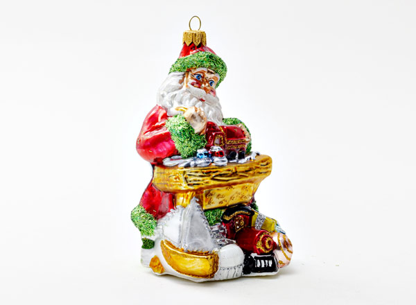 Christmas tree toy Santa Claus makes toys