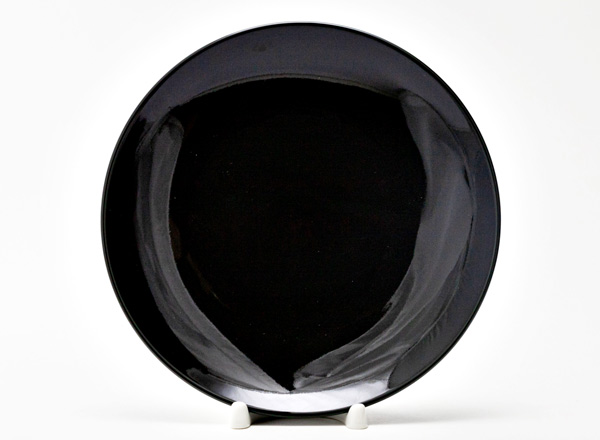Plate shallow The Baltic coast is black