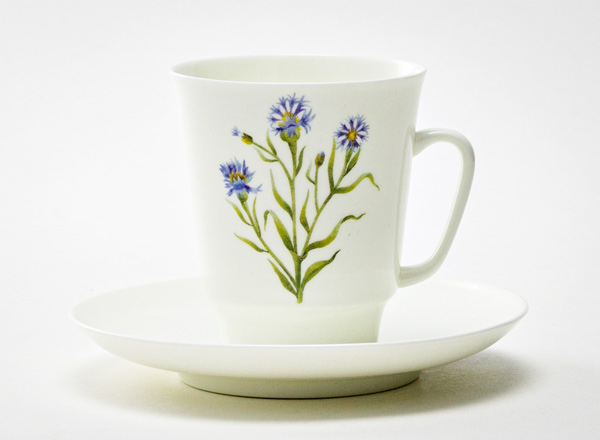 Cup and saucer Coffee Flowers and berries. Cornflower Home May